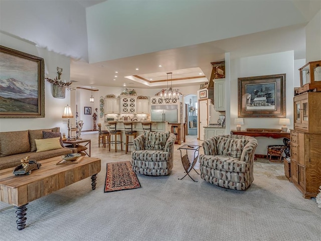 3122 Thornbrooke Blvd, Edmond, OK 73013 - living room with light colored carpet, a chandelier, and recessed lighting