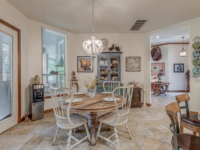 3122 Thornbrooke Blvd, Edmond, OK 73013 - dining space with a chandelier and baseboards