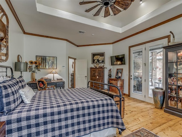 3122 Thornbrooke Blvd, Edmond, OK 73013 - bedroom featuring access to exterior, light wood-type flooring, and ornamental molding