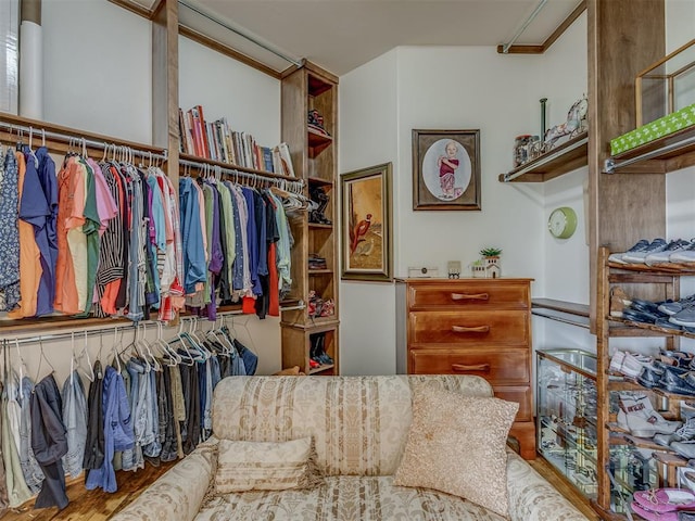 3122 Thornbrooke Blvd, Edmond, OK 73013 - spacious closet featuring wood finished floors