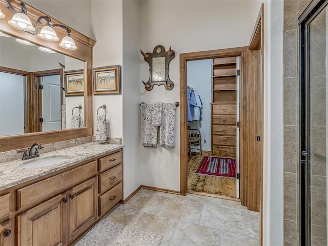 3122 Thornbrooke Blvd, Edmond, OK 73013 - full bath with vanity, a shower with door, and baseboards