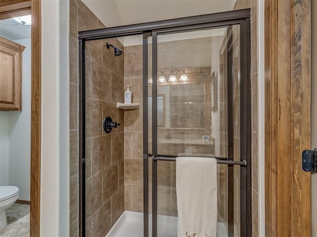 3122 Thornbrooke Blvd, Edmond, OK 73013 - bathroom featuring toilet and a shower stall
