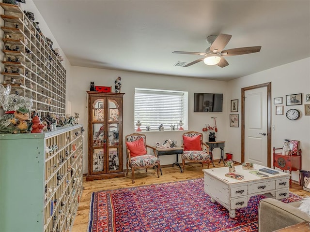 3122 Thornbrooke Blvd, Edmond, OK 73013 - living room featuring a ceiling fan and wood finished floors