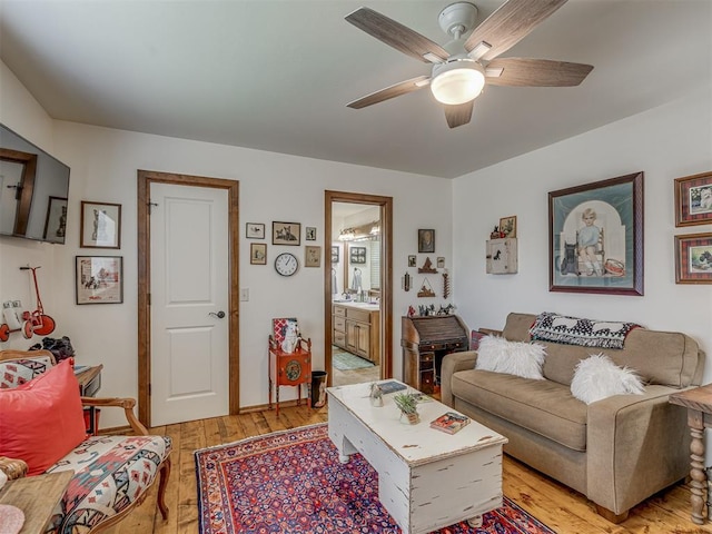 3122 Thornbrooke Blvd, Edmond, OK 73013 - living area featuring light wood-style floors and a ceiling fan