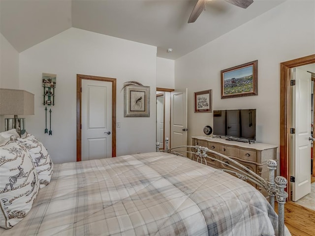 3122 Thornbrooke Blvd, Edmond, OK 73013 - bedroom with lofted ceiling, a ceiling fan, and wood finished floors