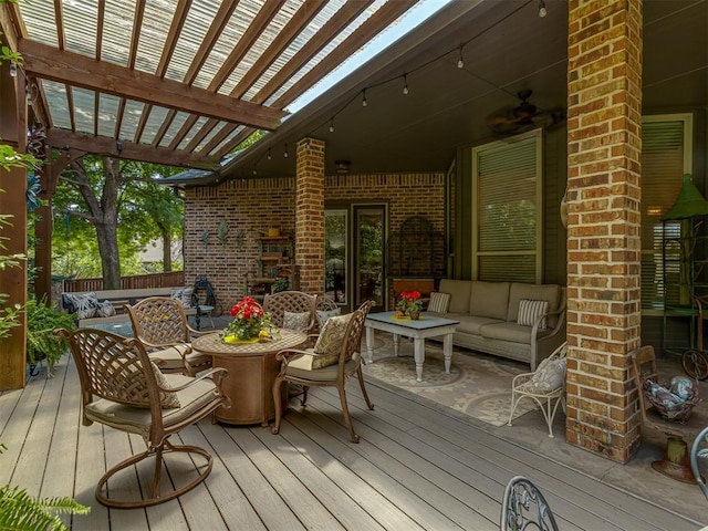 3122 Thornbrooke Blvd, Edmond, OK 73013 - deck featuring outdoor lounge area, a pergola, ceiling fan, and outdoor dining area