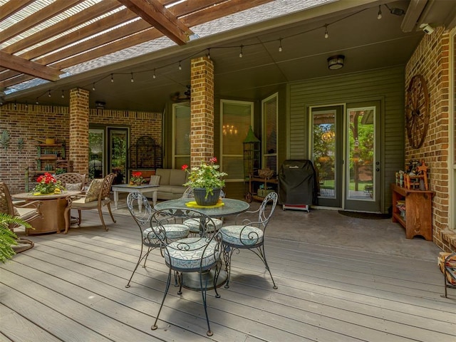 3122 Thornbrooke Blvd, Edmond, OK 73013 - wooden terrace featuring a pergola, a grill, and outdoor dining space