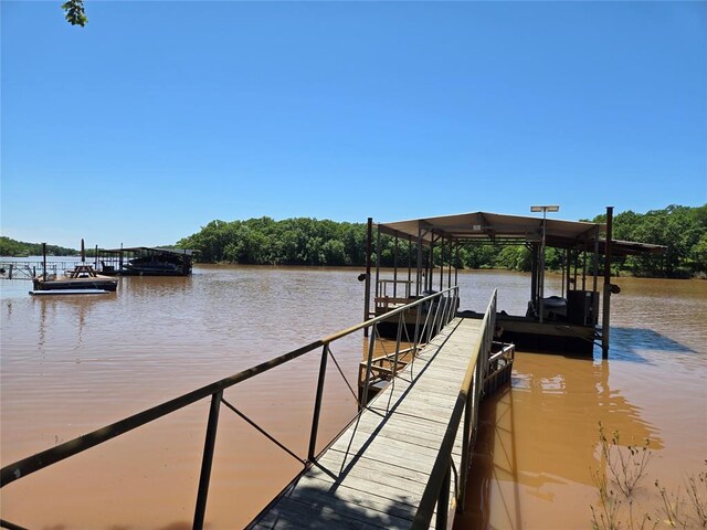 110534 S 4183rd Rd, Checotah, OK 74426 - dock with boat lift and a water view