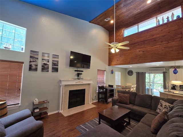 110534 S 4183rd Rd, Checotah, OK 74426 - living area with high vaulted ceiling, a high end fireplace, ceiling fan, wood finished floors, and baseboards