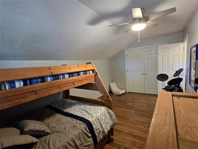 110534 S 4183rd Rd, Checotah, OK 74426 - bedroom with wood finished floors, lofted ceiling, ceiling fan, baseboards, and a closet