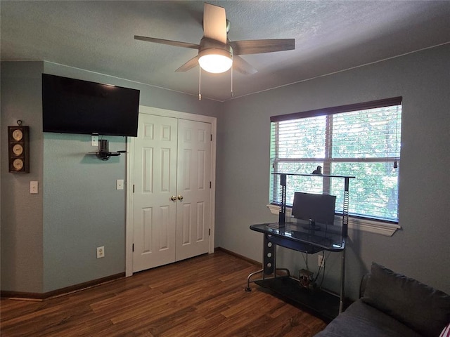 110534 S 4183rd Rd, Checotah, OK 74426 - home office with a ceiling fan, wood finished floors, and baseboards