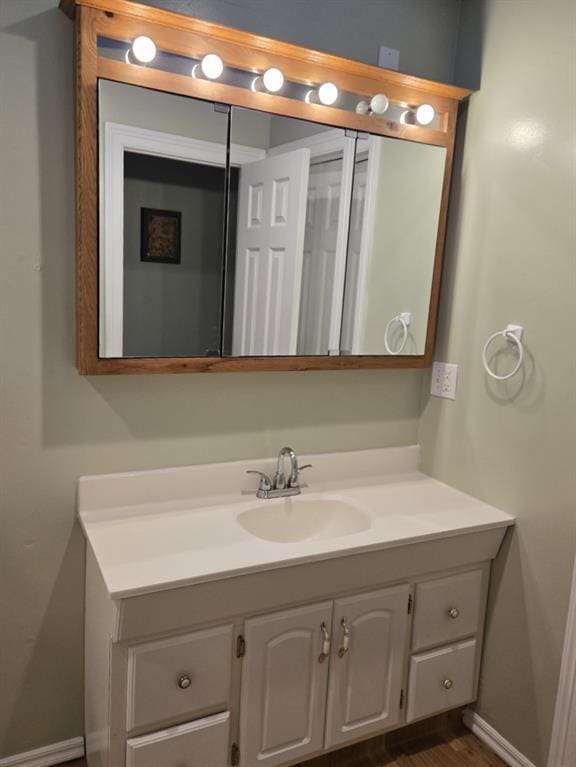 110534 S 4183rd Rd, Checotah, OK 74426 - bathroom with vanity and baseboards