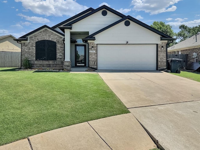 3105 SW 104th Ter, Oklahoma City, OK 73159 - view of front of home featuring concrete driveway, an attached garage, and brick siding
