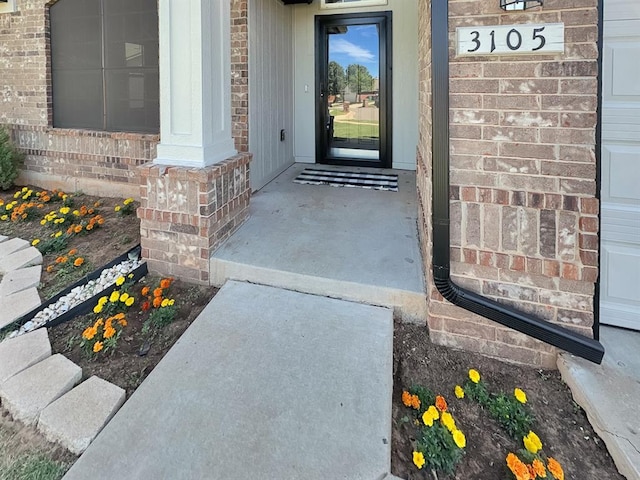 3105 SW 104th Ter, Oklahoma City, OK 73159 - property entrance featuring brick siding