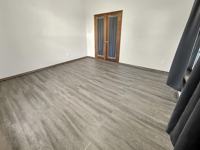 3105 SW 104th Ter, Oklahoma City, OK 73159 - spare room with wood finished floors and baseboards