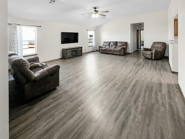 3105 SW 104th Ter, Oklahoma City, OK 73159 - living room with wood finished floors, plenty of natural light, ceiling fan, and vaulted ceiling