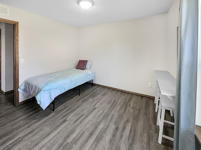 3105 SW 104th Ter, Oklahoma City, OK 73159 - bedroom with wood finished floors and baseboards