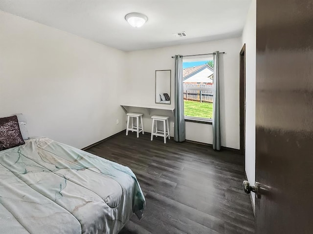 3105 SW 104th Ter, Oklahoma City, OK 73159 - bedroom featuring wood finished floors and baseboards