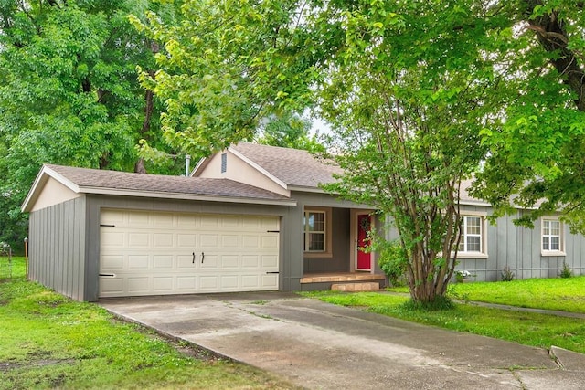 408 S 6th St, Davis, OK 73030 - view of front of home featuring concrete driveway, a garage, covered porch, and a front yard