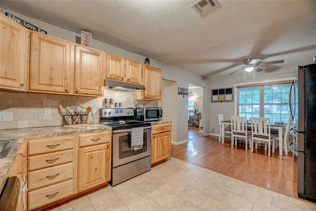 408 S 6th St, Davis, OK 73030 - kitchen featuring stainless steel appliances, light brown cabinetry, under cabinet range hood, light countertops, and ceiling fan