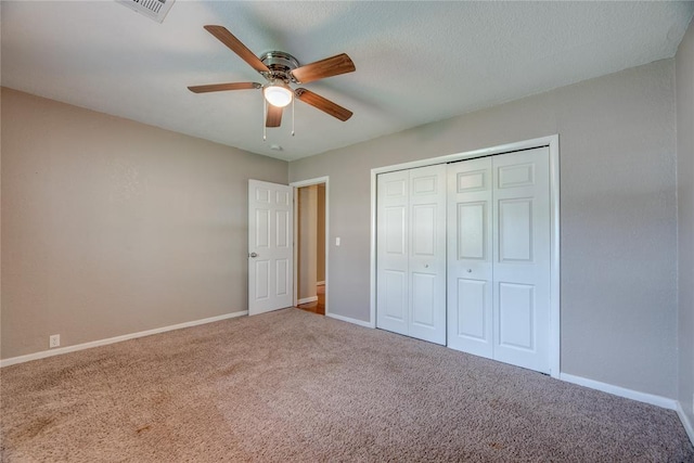 408 S 6th St, Davis, OK 73030 - unfurnished bedroom featuring carpet floors, baseboards, ceiling fan, and a closet