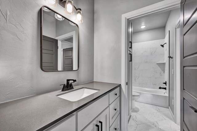 1008 Collis Way, Newcastle, OK 73065 - full bathroom with marble look tile flooring, toilet, vanity, a textured wall, and shower / washtub combination
