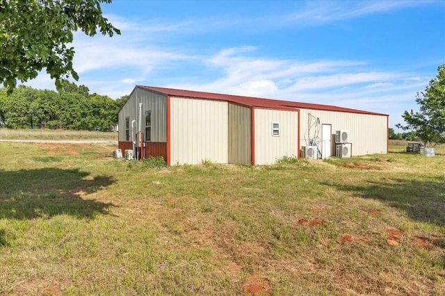 2273 County Road 1240, Blanchard, OK 73010 - view of pole building with a yard and ac unit