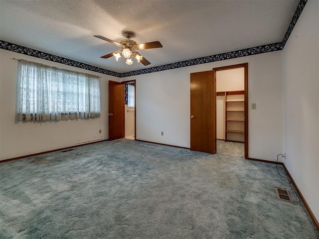 4004 N Shannon Ave, Bethany, OK 73008 - carpeted spare room featuring ceiling fan, a textured ceiling, and baseboards