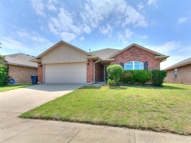 7909 Dawn Cir, Oklahoma City, OK 73135 - single story home featuring an attached garage, a front yard, concrete driveway, and brick siding
