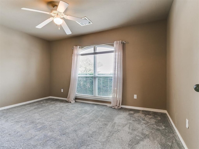 7909 Dawn Cir, Oklahoma City, OK 73135 - unfurnished room with carpet flooring, baseboards, and ceiling fan