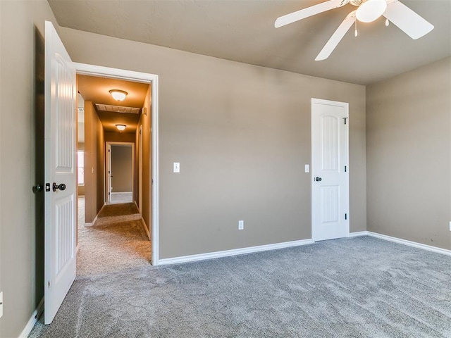 7909 Dawn Cir, Oklahoma City, OK 73135 - unfurnished room with carpet flooring, a ceiling fan, and baseboards