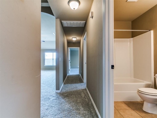 7909 Dawn Cir, Oklahoma City, OK 73135 - hallway featuring carpet