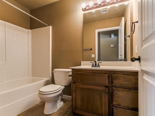7909 Dawn Cir, Oklahoma City, OK 73135 - full bath featuring a textured wall, toilet, vanity, tile patterned flooring, and shower / tub combination