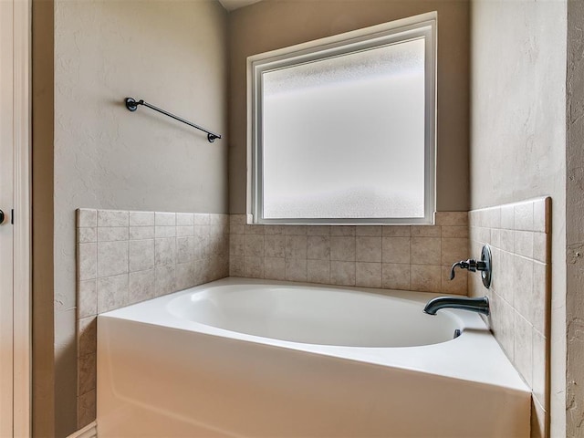 7909 Dawn Cir, Oklahoma City, OK 73135 - full bath with a bath and a textured wall