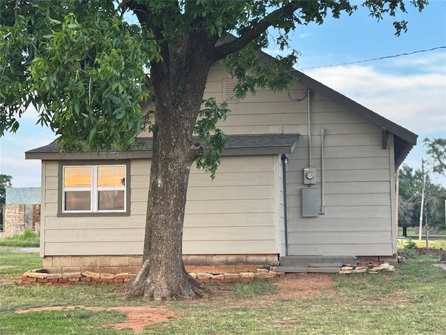 214 N 3rd St, Sentinel, OK 73664 - view of side of home with a lawn