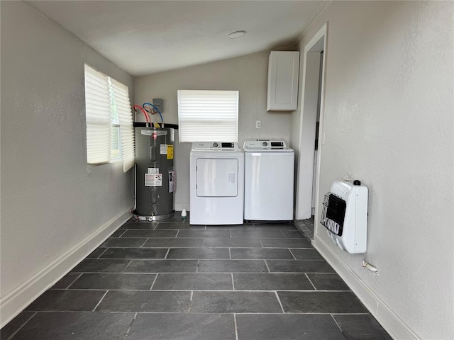 214 N 3rd St, Sentinel, OK 73664 - washroom featuring water heater, heating unit, independent washer and dryer, baseboards, and cabinet space