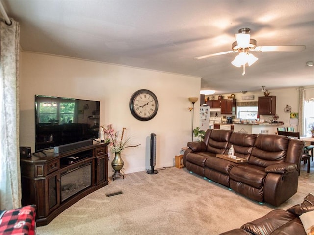 920245 S 3300th Rd, Wellston, OK 74881 - living room featuring light carpet and a ceiling fan