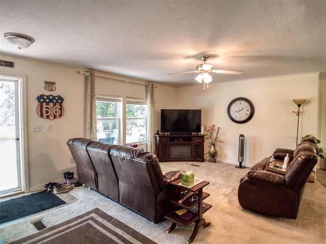 920245 S 3300th Rd, Wellston, OK 74881 - living room featuring carpet floors, a textured ceiling, and ceiling fan