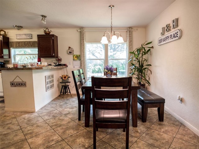 920245 S 3300th Rd, Wellston, OK 74881 - dining room featuring a chandelier, plenty of natural light, baseboards, and light tile patterned floors