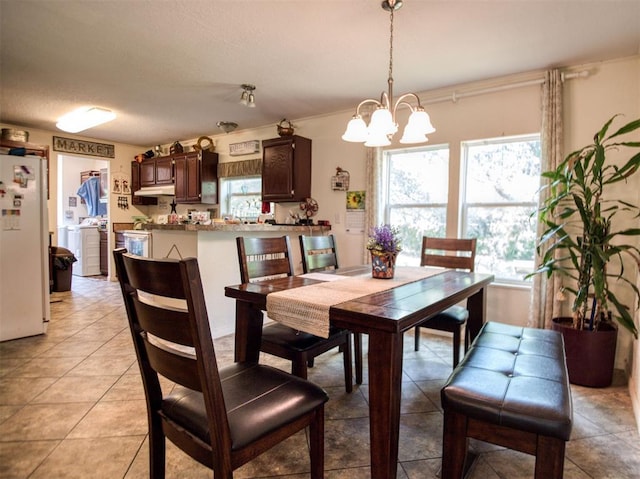 920245 S 3300th Rd, Wellston, OK 74881 - dining area with a chandelier and light tile patterned floors