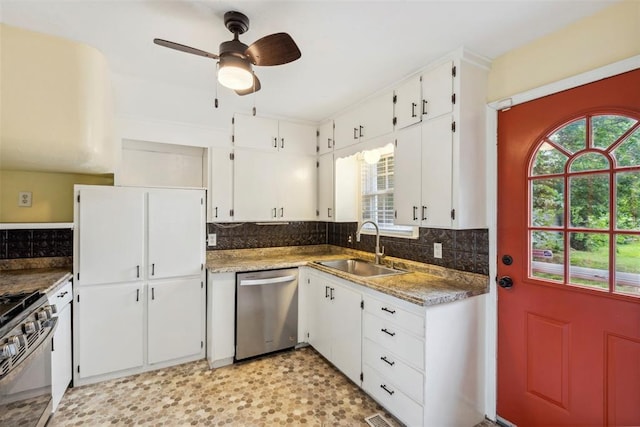 1535 NW 39th St, Oklahoma City, OK 73118 - kitchen featuring stainless steel appliances, a sink, backsplash, and healthy amount of natural light