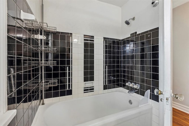 1535 NW 39th St, Oklahoma City, OK 73118 - full bathroom featuring bathing tub / shower combination and wood finished floors