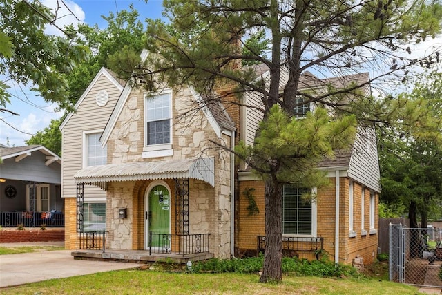 1535 NW 39th St, Oklahoma City, OK 73118 - view of front of house with stone siding and brick siding