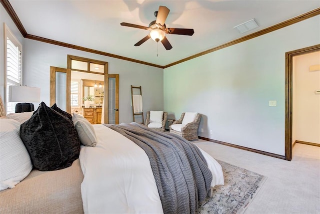 5905 Smoky Hill Trl, Edmond, OK 73034 - carpeted bedroom featuring baseboards, crown molding, connected bathroom, and a ceiling fan