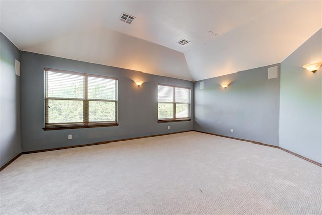 5905 Smoky Hill Trl, Edmond, OK 73034 - carpeted spare room with vaulted ceiling and baseboards