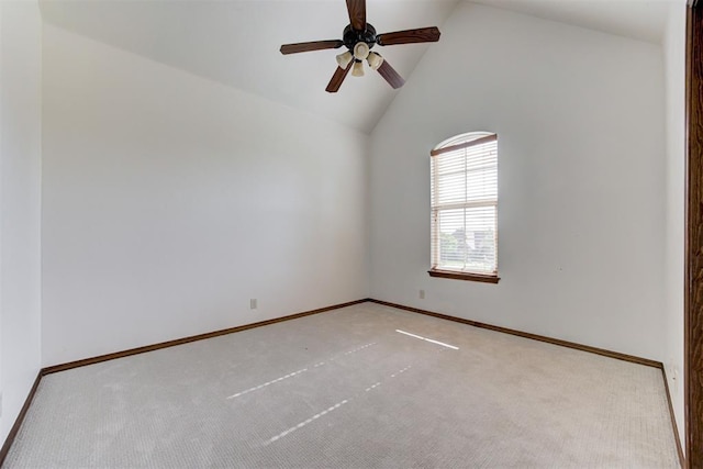 5905 Smoky Hill Trl, Edmond, OK 73034 - unfurnished room featuring light colored carpet, vaulted ceiling, baseboards, and a ceiling fan