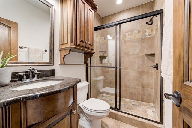 5905 Smoky Hill Trl, Edmond, OK 73034 - full bath featuring toilet, vanity, and a shower stall