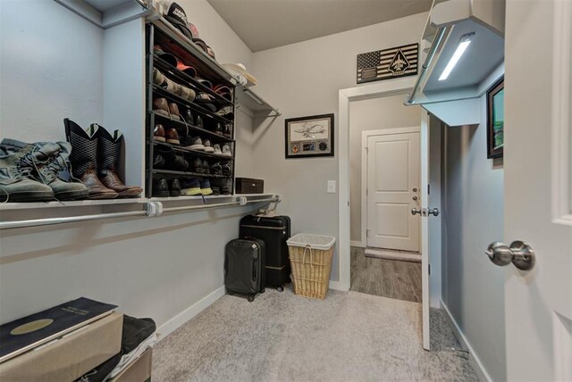 11734 Split Oak Cir, Guthrie, OK 73044 - walk in closet featuring carpet flooring