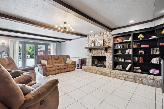 2208 Amber Rd, Oklahoma City, OK 73170 - living area with a textured ceiling, tile patterned flooring, beamed ceiling, a fireplace, and a chandelier
