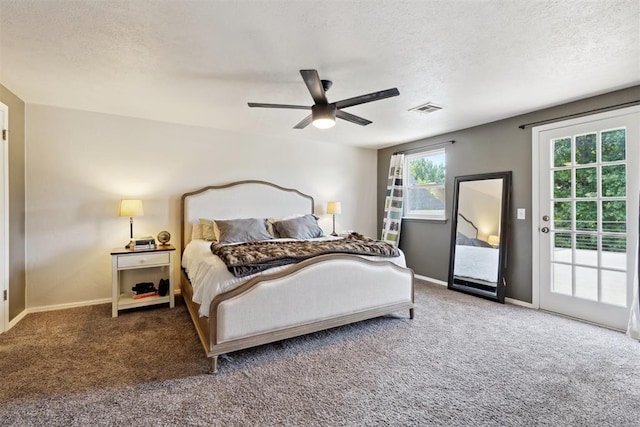 2208 Amber Rd, Oklahoma City, OK 73170 - carpeted bedroom with access to outside, baseboards, a textured ceiling, and ceiling fan